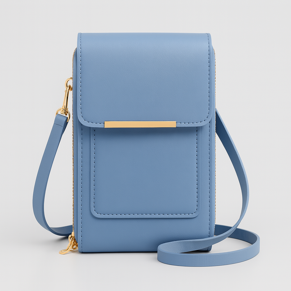 The Elina Compact Crossbody Bag in smooth leather with adjustable strap, secure zip closure, and lightweight minimalist design, ideal for daily wear and travel