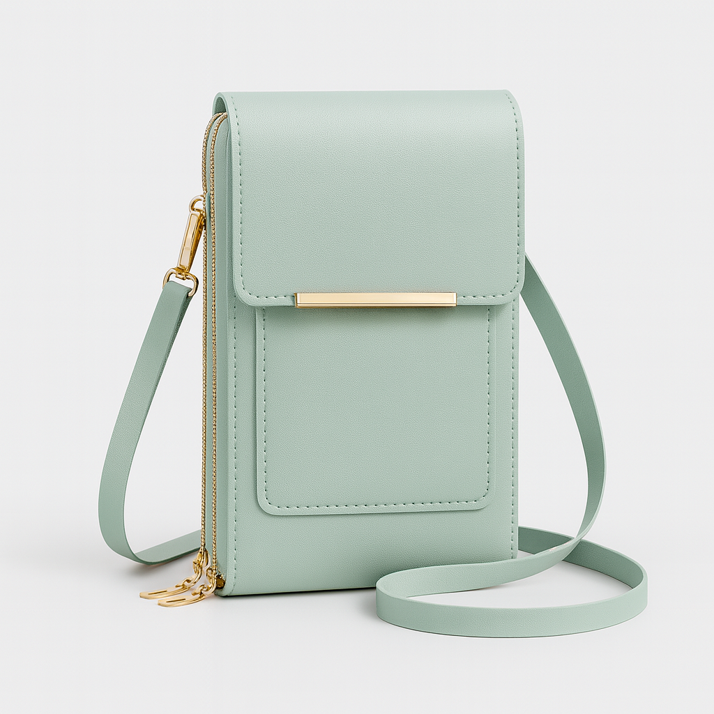 The Elina Compact Crossbody Bag in smooth leather with adjustable strap, secure zip closure, and lightweight minimalist design, ideal for daily wear and travel