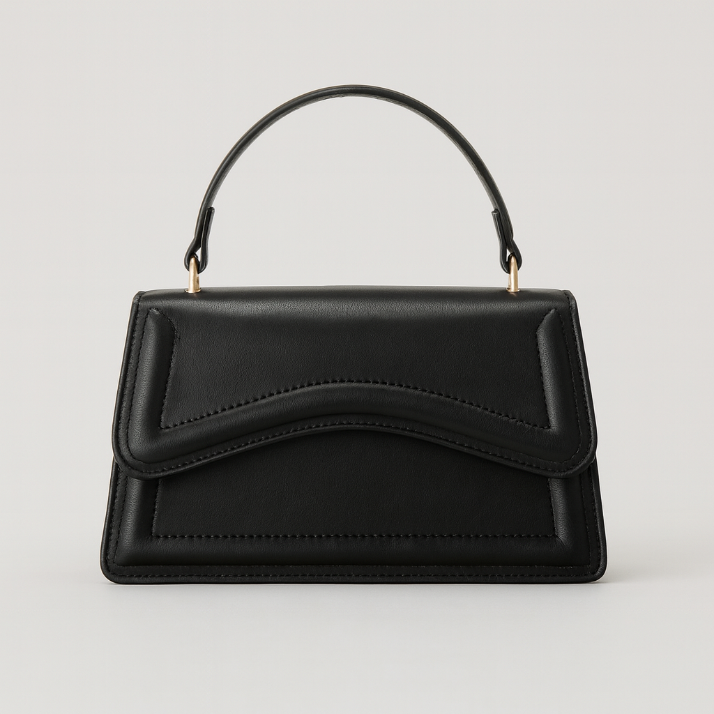 Elegant handbag with smooth leather body, wave-detail design, structured silhouette, and detachable strap for versatile styling