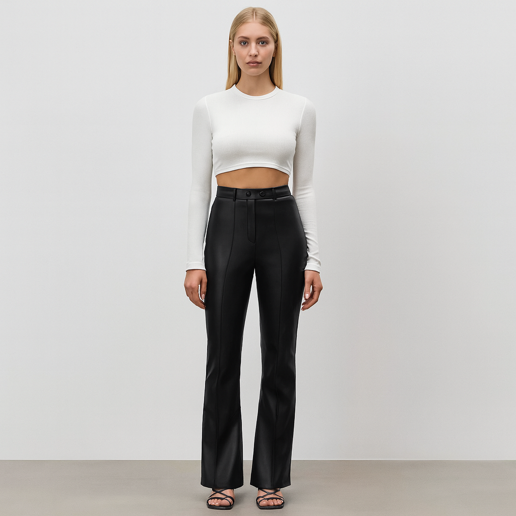 Women’s faux leather trousers with a high-rise waist and straight-leg silhouette, finished in smooth leather-look fabric for sleek everyday wear.