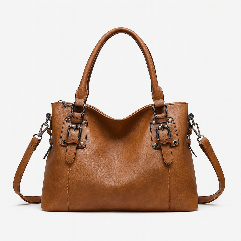 Convertible leather handbag with structured silhouette, detachable shoulder strap, top handles, and versatile design for work or evening wear