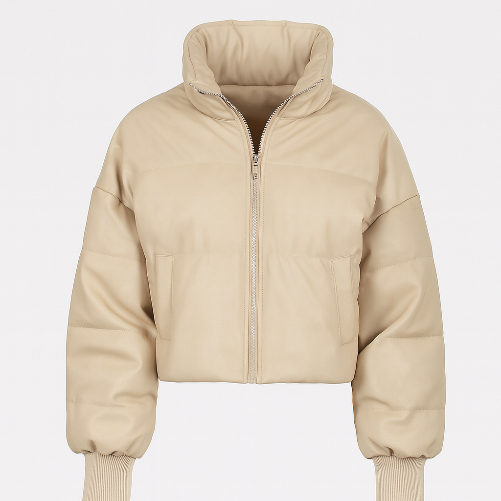 Cream oversized puffer jacket with high collar, long sleeves, and zip closure styled for cold weather wear.