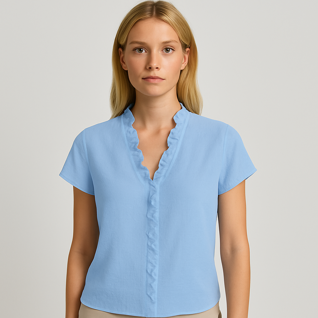 Light blue short sleeve blouse with V-neckline and ruffle trim detail.